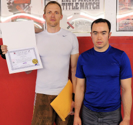 Nate Cary and Professor Billy Hendricks purple belt promotion